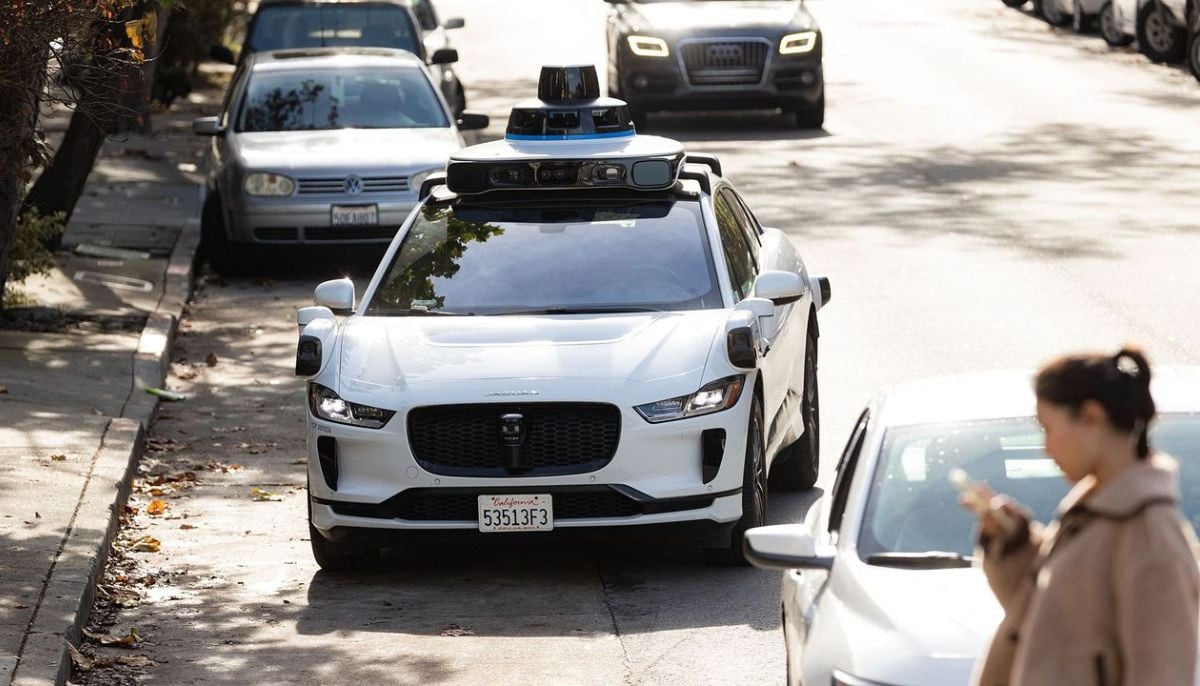 Thousands of humans enhance AI driving for robotaxis