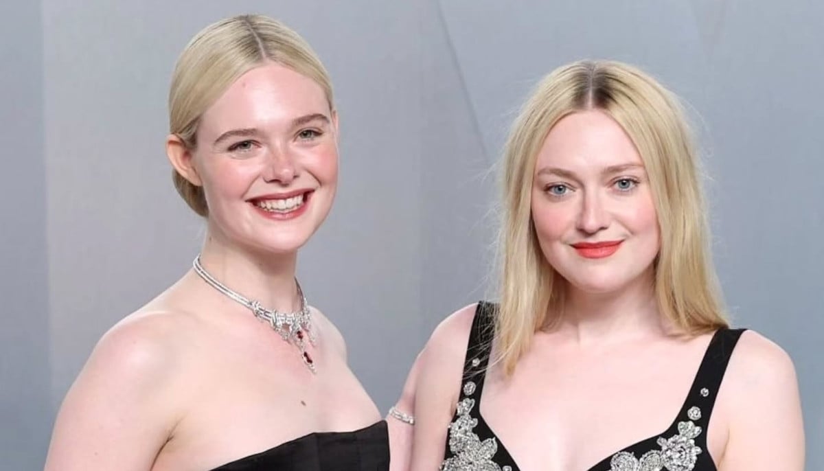 Elle Fanning shows of handmade scarf knitted by sister Dakota