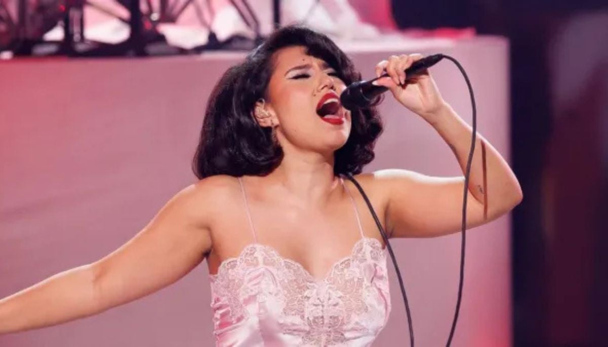 Raye fuels James Bond theme song rumours at iHeartRadio Music Awards