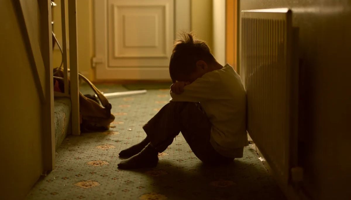 Mother abuses child with belt, strangles, and kicks until teacher is informed