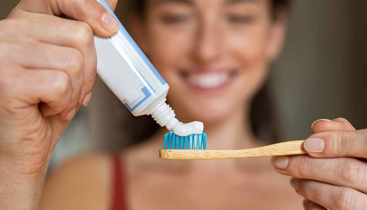 Why teeth often remain yellow despite consistent and regular brushing?