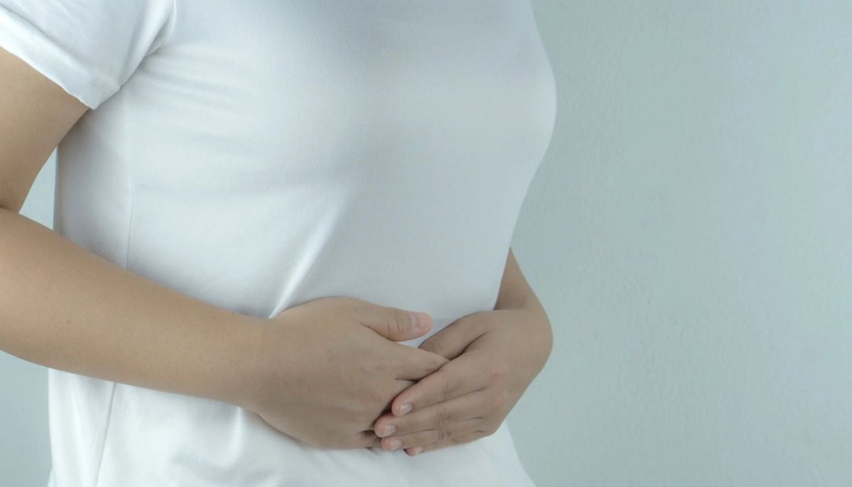 How to perform gentle stomach massages to encourage regular bowel movements