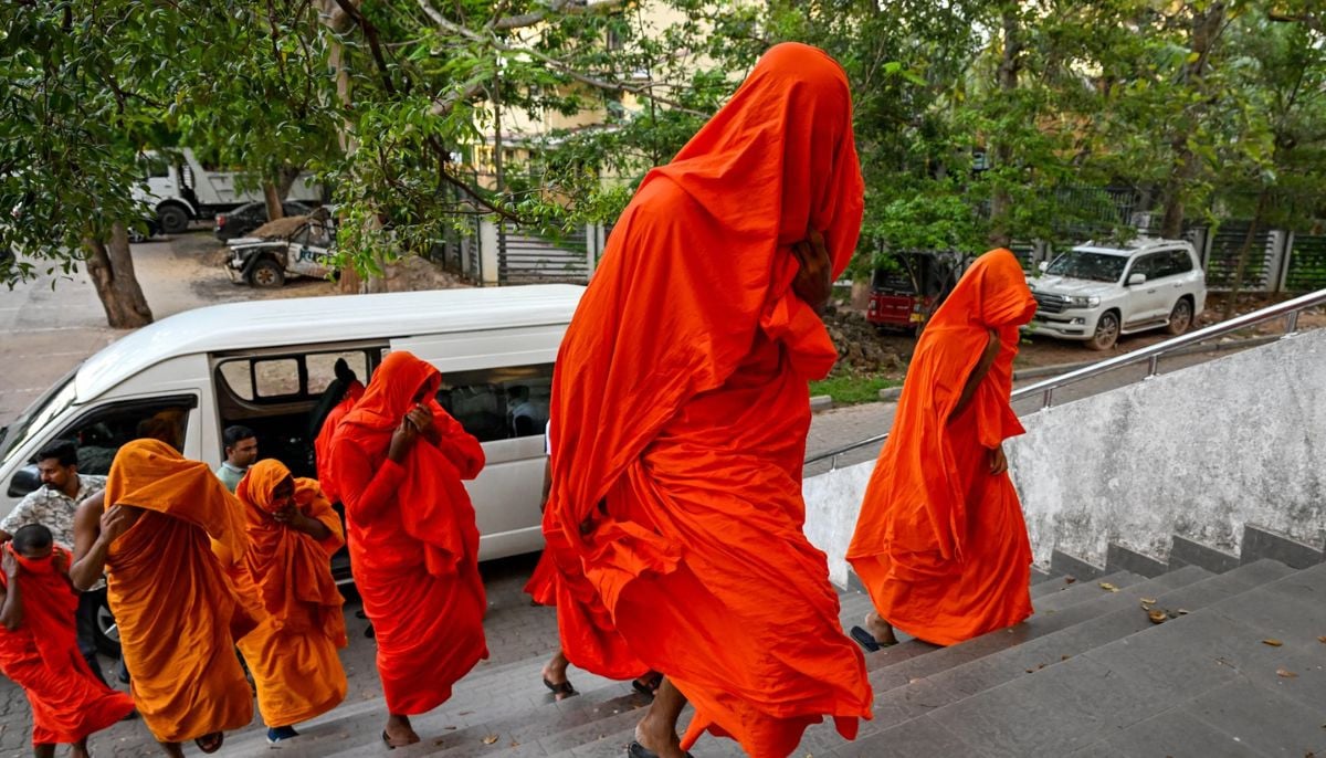 22 monks detained at airport in historic drug bust