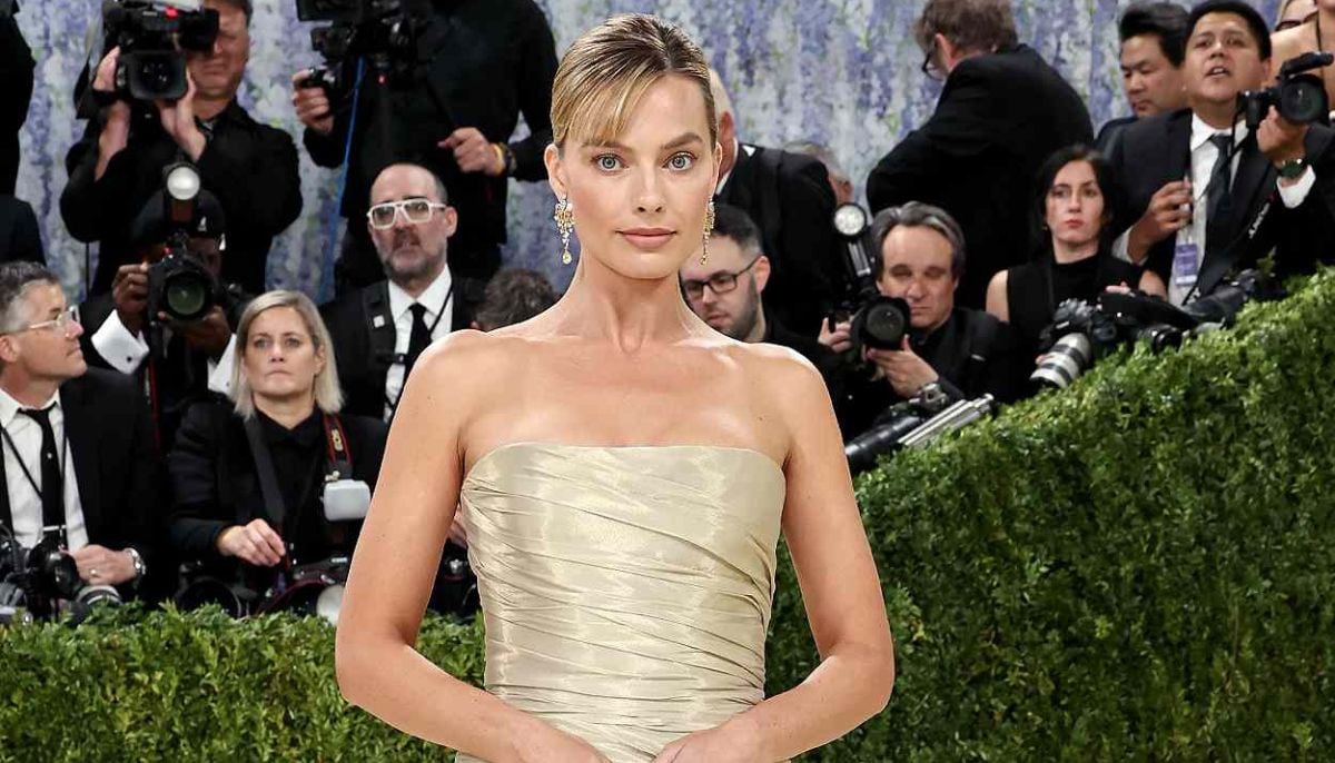 Margot Robbie returns to Met Gala in custom gold Chanel gown