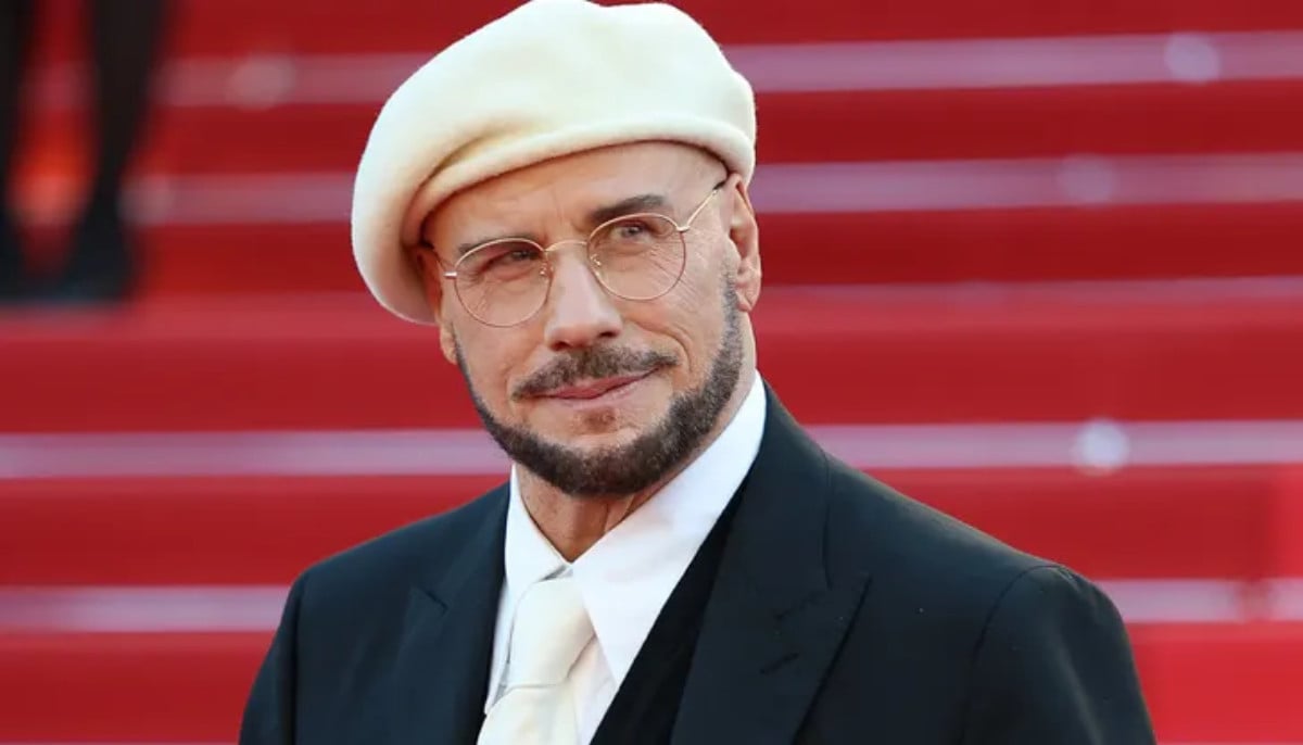 John Travolta’s Cannes red carpet look triggers plastic surgery speculation