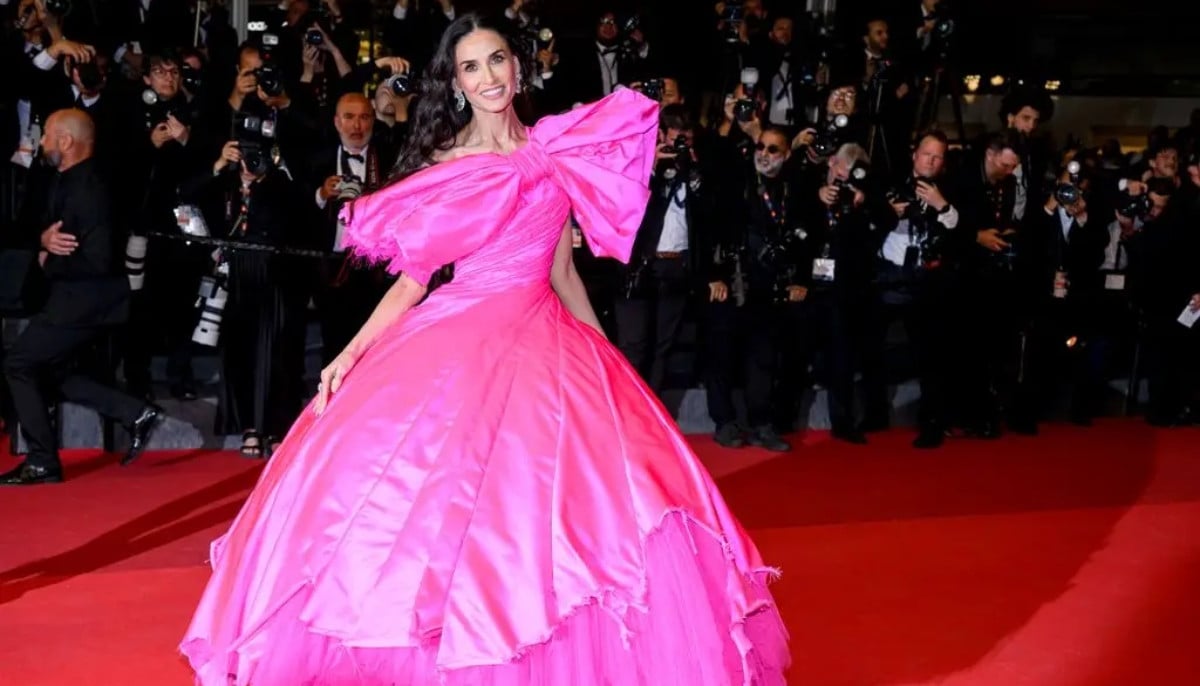 Demi Moore dazzles in pink bow gown as stars light up Cannes red carpet