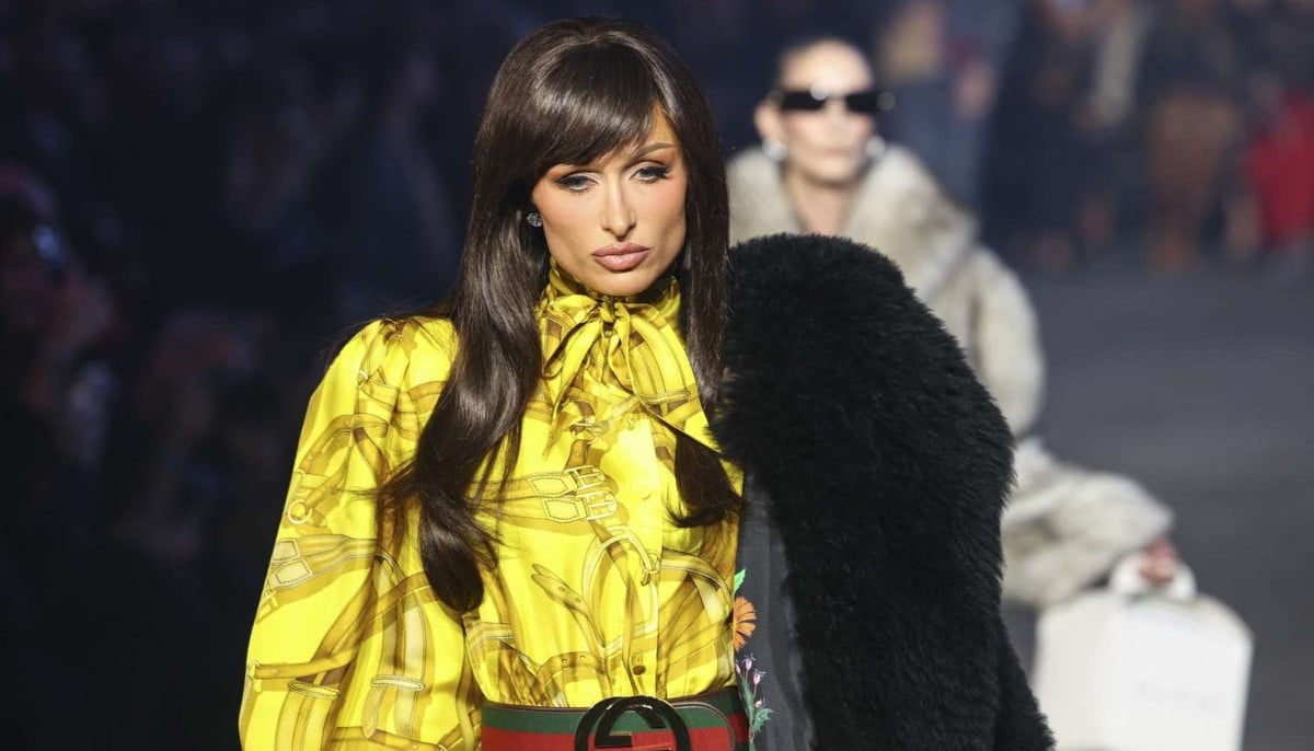 Paris Hilton debuts shocking dark hair transformation during Gucci runway appearance