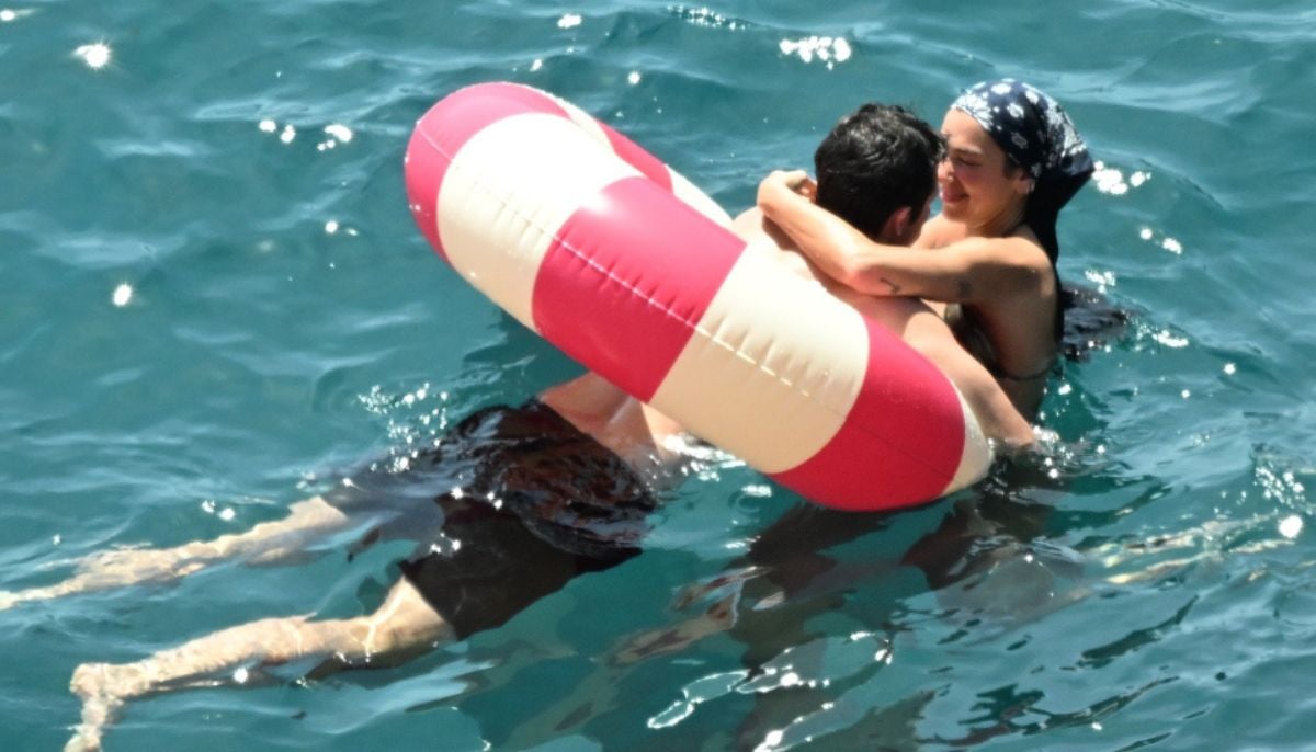 Dua Lipa wears gold bikini on honeymoon with husband