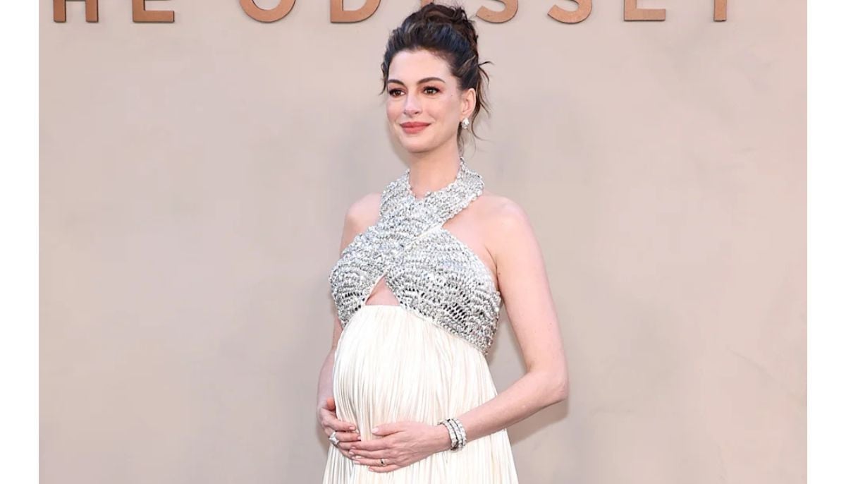 Anne Hathaway receives handmade baby gift during Odyssey interview
