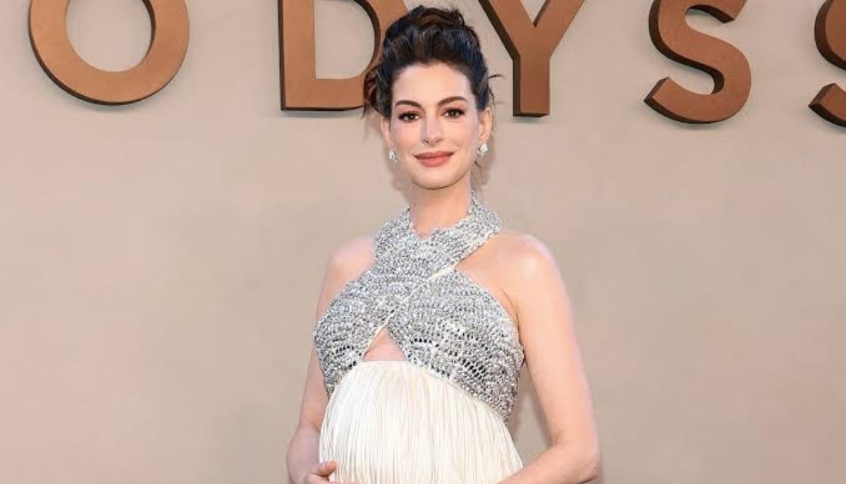 Anne Hathaway fights back tears after Whoopi Goldberg's emotional tribute