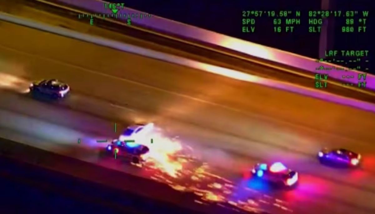 Florida police shoot at murder suspect following car pursuit