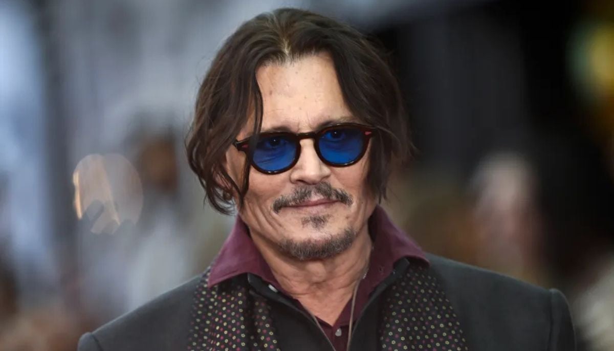 Johnny Depp plays Ebenezer Scrooge in dark fantasy film