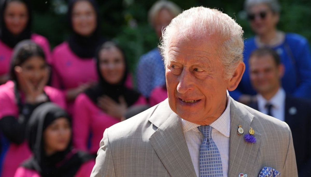King Charles maintains formal dress code during England heatwave