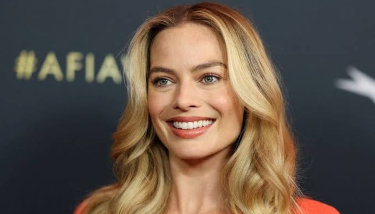 Margot Robbie turns heads in chic yellow ensemble during Paris stroll