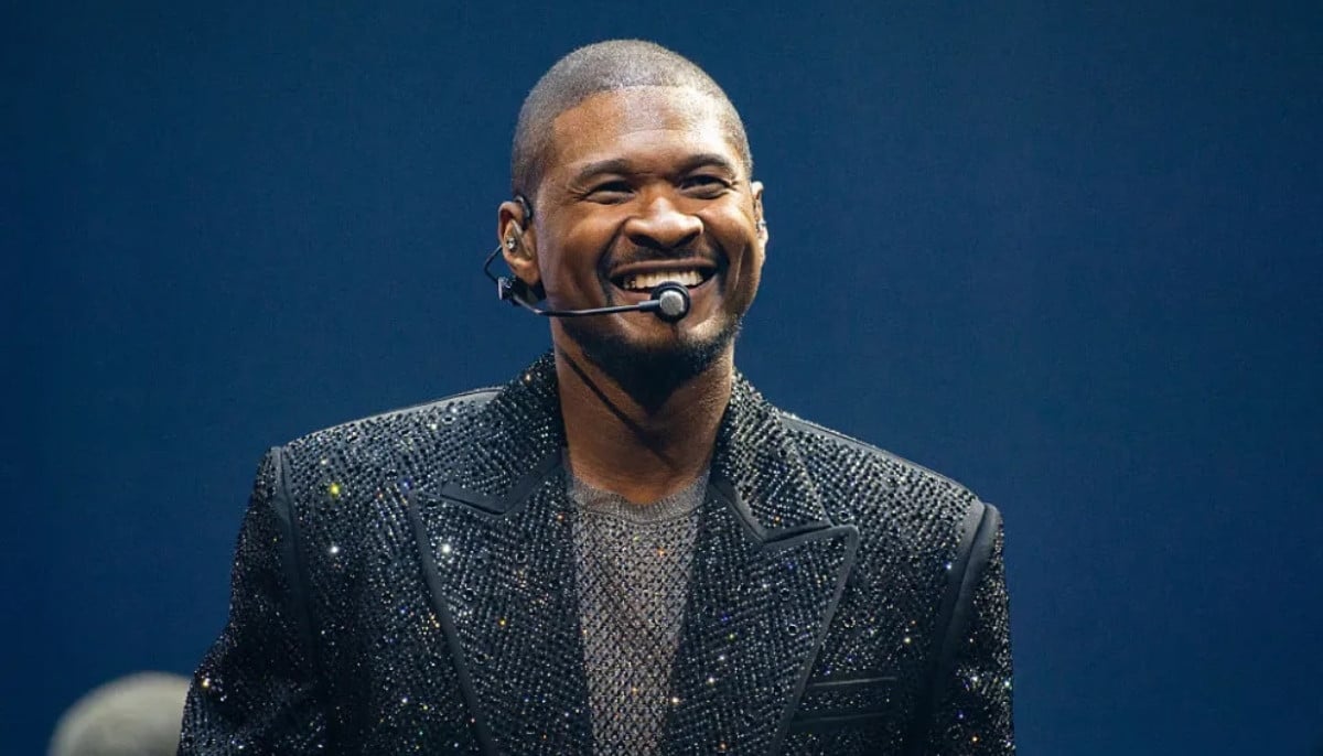 Usher halts viral fan moment after awkward onstage reaction