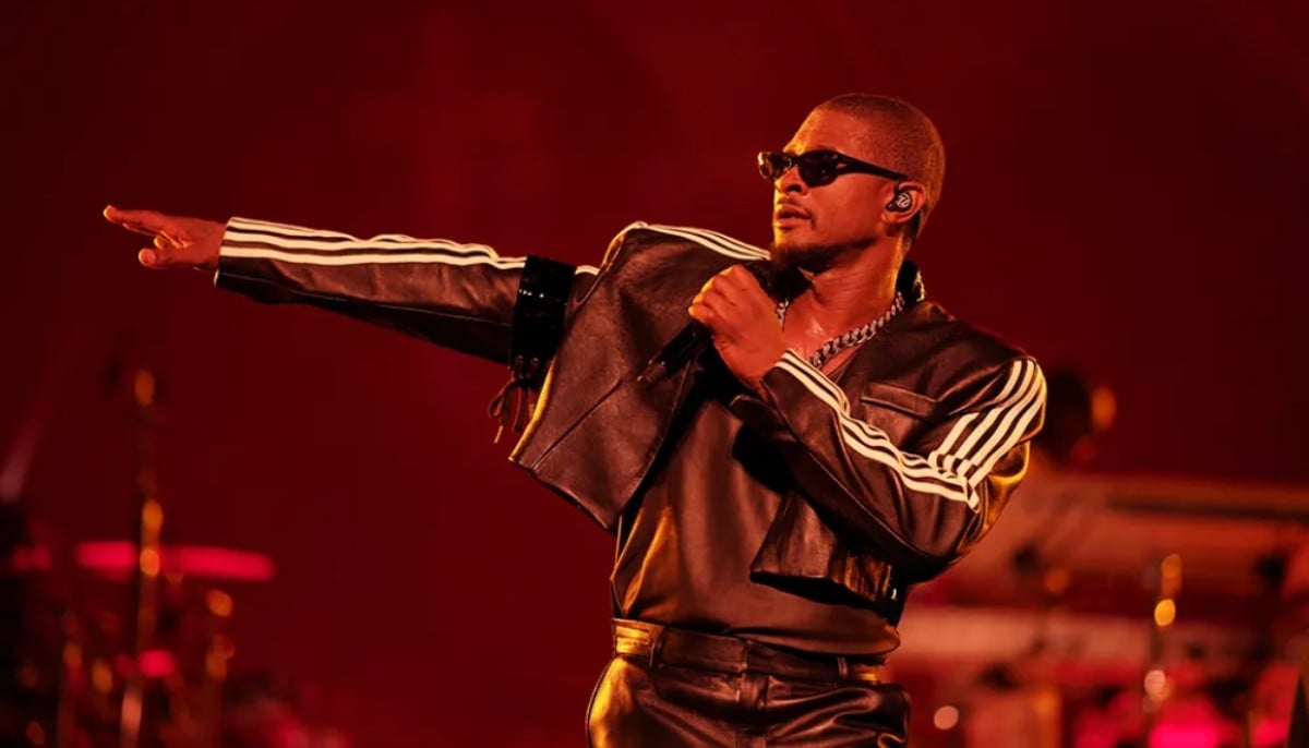 Usher stops onstage dance after noticing fan&amp;apos;s reaction