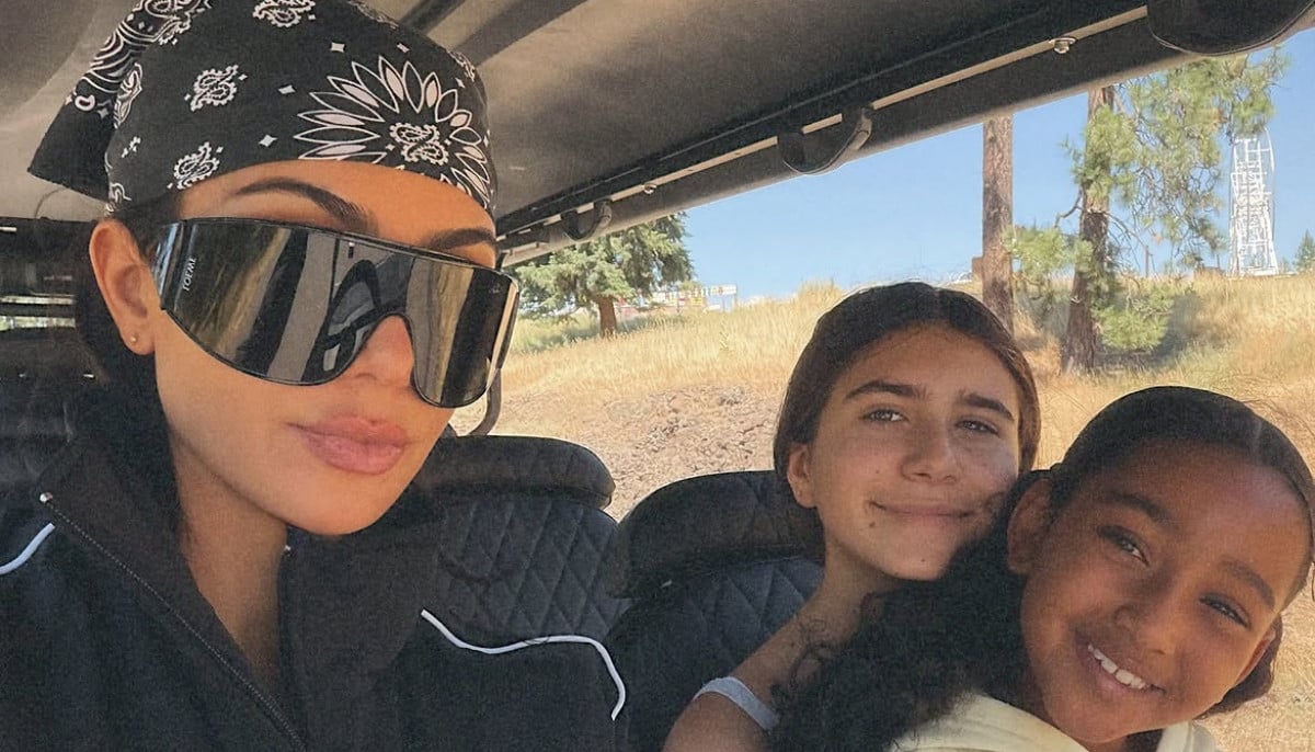 Kim Kardashian goes paddleboarding with Penelope Disick during summer escape