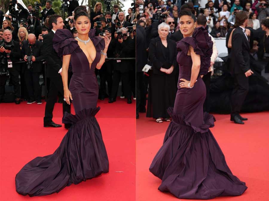Salma Hayek sets 2023 Cannes Film Festival red carpet on fire in plunging violet gown