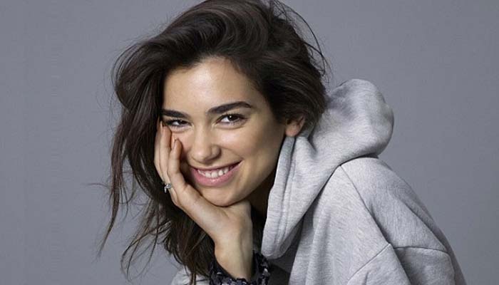 Dua Lipa reflects on childhood moving between London and Kosovo