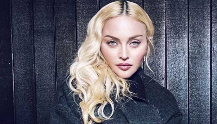 Madonna chops off long hair inches for shaggy mullet