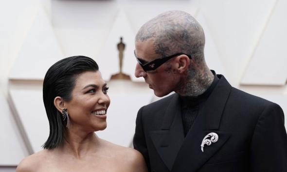 Kourtney Kardashian proudly shows off baby bump on recent outing with Travis Barker 