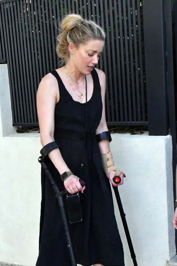 ‘Aquaman 2 star Amber Heard sports crutches during Madrid visit