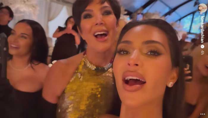 Kim Kardashian enjoys Christmas sledding and sliving in snow with Paris Hilton