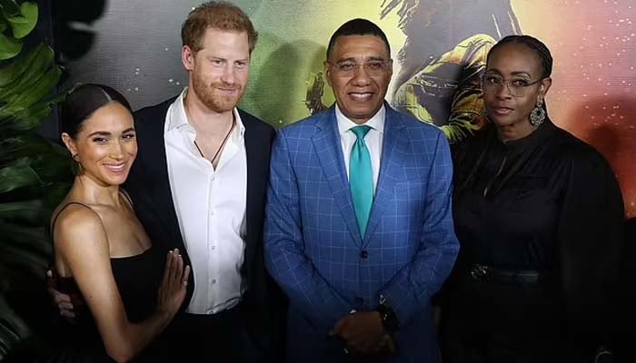 Harry and Meghan face backlash for posing with Jamaicas Prime Minister