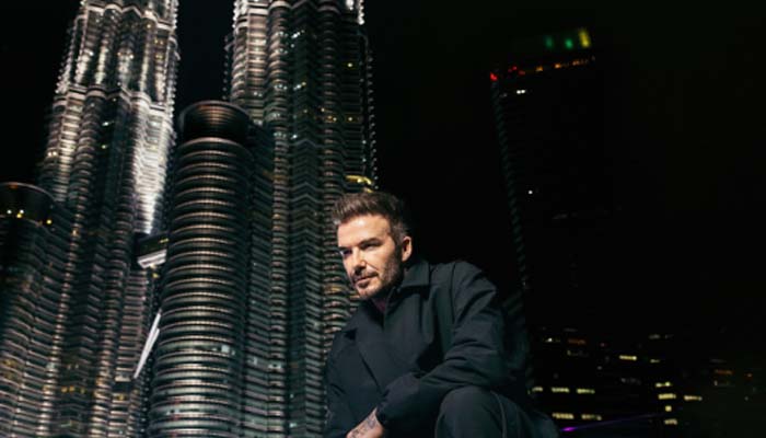 David Beckham poses in front of Petronas Twin Towers: what a view