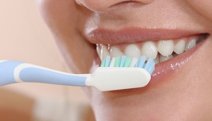 Not brushing teeth at night may be risky for your heart health