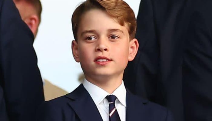 Prince William and Kate Middletons son turns heads at Palace tea party
