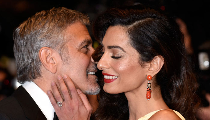 George Clooneys body language puts his marriage in question