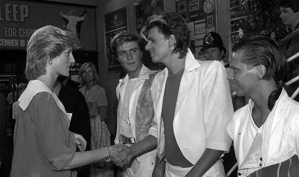 Princess Diana greeting members of Duran Duran in 1983/Getty Images
