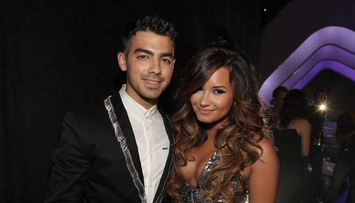 Joe Jonas, Demi Lovato sparkle on stage despite complicated history