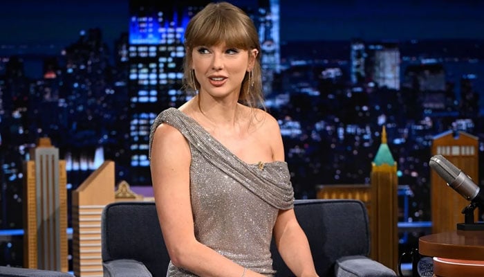 Taylor Swift Dazzles in $2K crystal mini dress on Jimmy Fallon