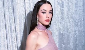 Katy Perry shocks fans as she chomps on cardboard in wild new Instagram reel