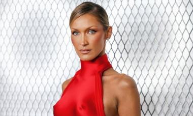 Bella Hadid turns heads in fiery red at 'The Beauty' NYC premiere