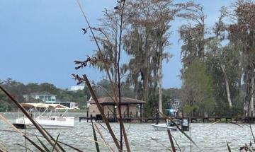 Body of missing teen recovered after canoe capsizes on lake in bad weather