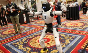 Staff forced to restrain dancing robot in 'celebration mode' at hotpot chain