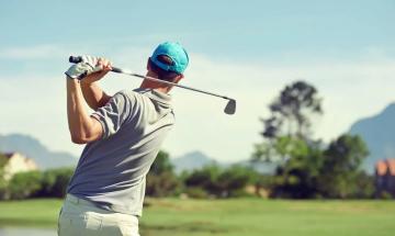 A professional golfer breaks rank to aid a child in a sudden course emergency.