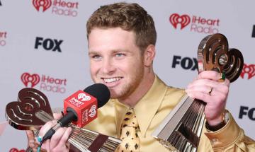 Alex Warren honors late parents with 2026 iHeartRadio breakthrough Artist Award