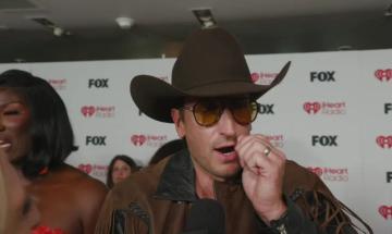 Russell Dickerson praises 'Hero' Keith Urban, shares post-divorce update