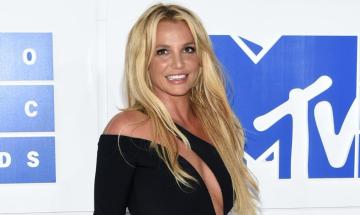 Britney Spears dances and smiles with her sons during rare yacht outing