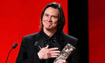 Jenny McCarthy confirms 'it was definitely' Jim Carrey at César Awards