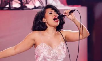 Raye fuels James Bond theme song rumours at iHeartRadio Music Awards