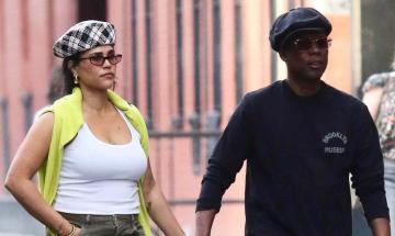 Chris Rock goes public with new relationship, shares kiss during NYC stroll