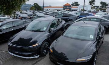 Georgia mother sues Tesla after son and father die in fiery crash