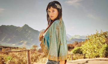 Kesha embraces nature in ocean for Earth Day: ‘The Divine Feminine’