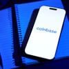 Coinbase reduces staff by 14% amid AI growth. shares increase