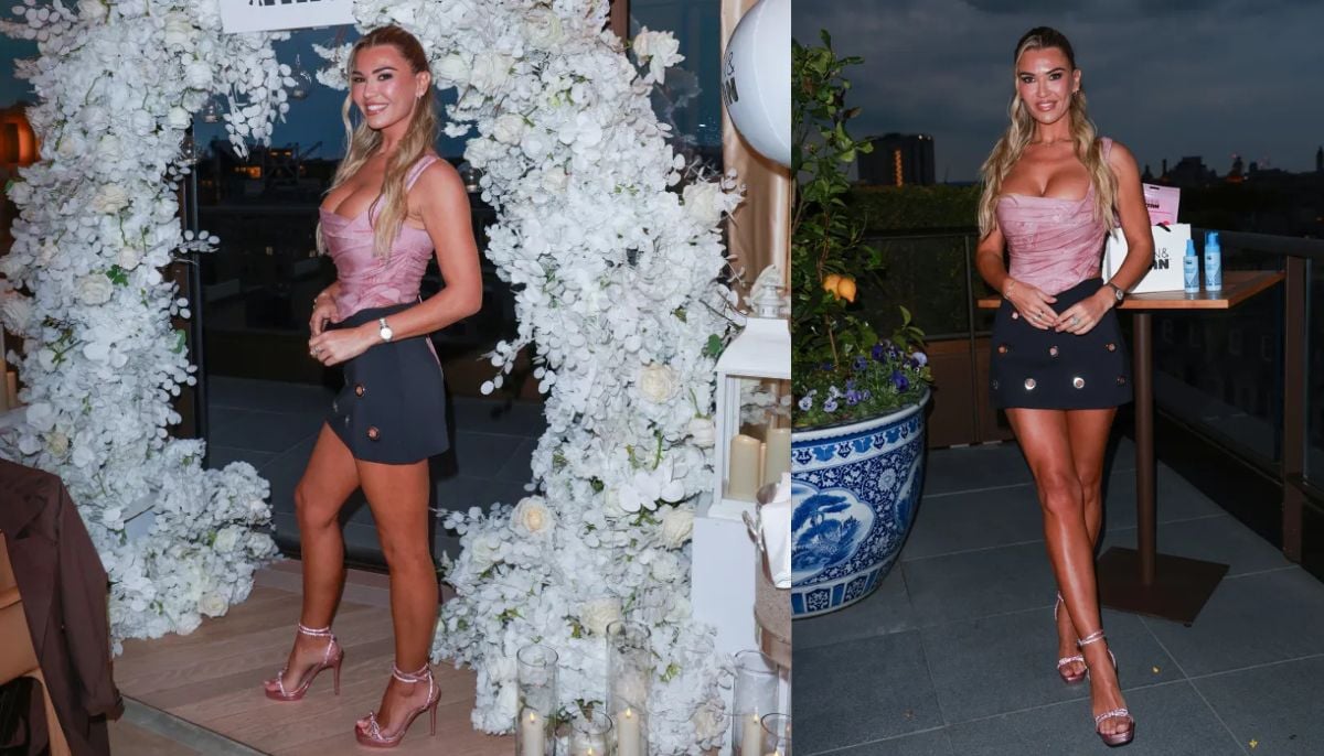 Christine McGuinness almost bursts out of tight corset at showbiz party